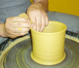 Eunsil Kim using the potters wheel